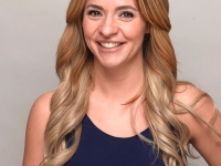 Smiling head shot- Lara Slater